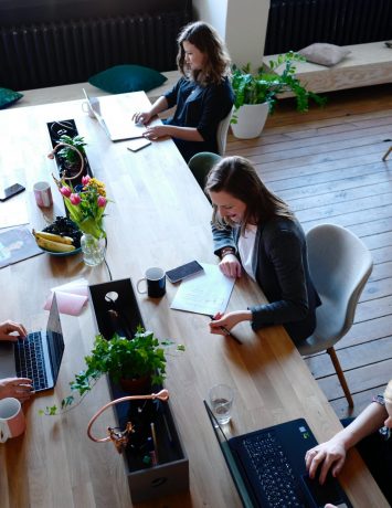 women-working-on-a-big-table